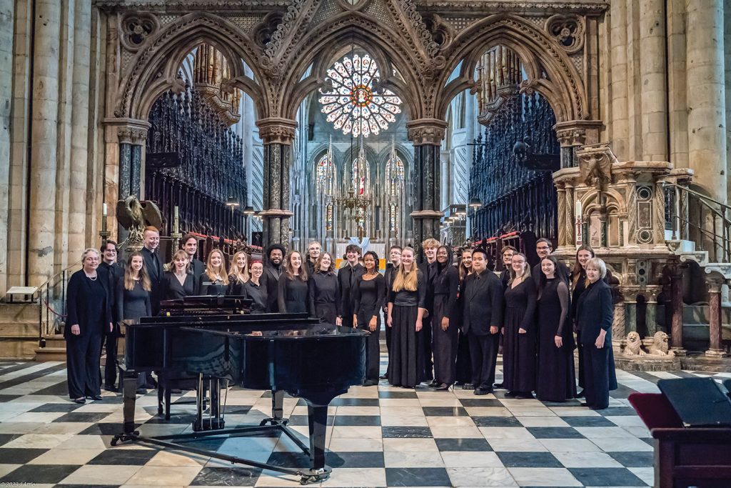 The Glee Club at Durham Cathedral in England, conducted by Donna M. Di Grazia, David J. Baldwin Professor of Music. Photo by John Attle