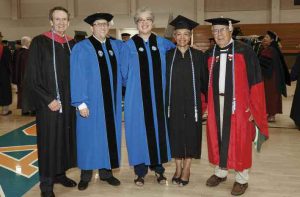 Starr poses with four chairs of Pomona’s Board of Trustees—from left: Stewart Smith ’68, current Chair Samuel D. Glick ’04, Starr, Jeanne M. Buckley ’65 and Dr. Robert E. Tranquada ’51.