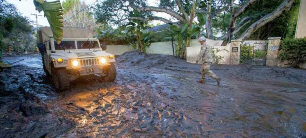 A member of the California National Guard on a rescue mission following the January 2018 mudslide in Montecito, California. (Air National Guard photo by Senior Airman Crystal Housman)