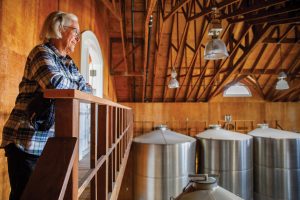 Cathy Corison ’75 and her husband built a new barn in 1999 to serve as the winery, which includes the large stainless steel tanks where fermentation occurs. Photography by Robert Durell