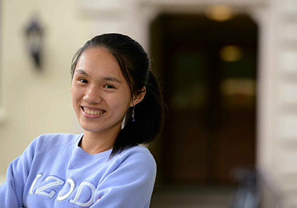  Photo of Hong Deng Gao ’15, with quote: “I found so many mentors, professors and people coming from different back-grounds that are so willing to talk to you, and have compas-sion for issues they haven’t really experienced before,”