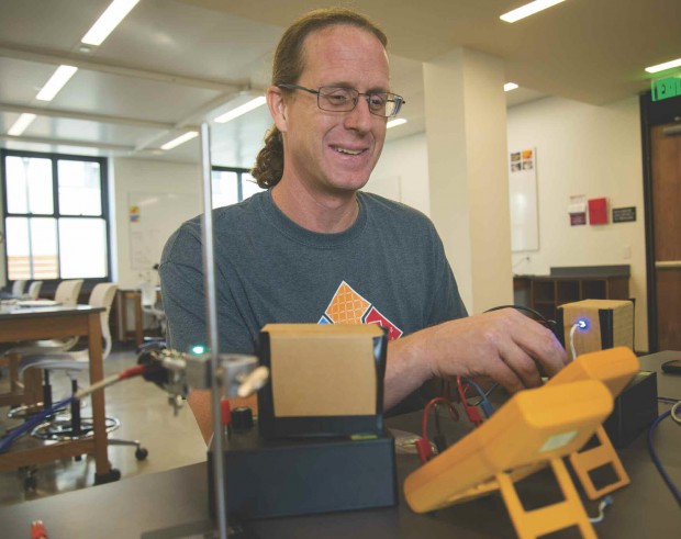 David Haley working with electronics