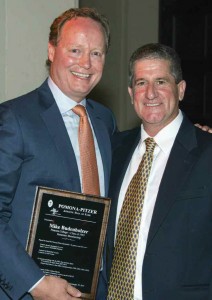 Mike Budenholzer poses with Coach Charles Katsiaficas.