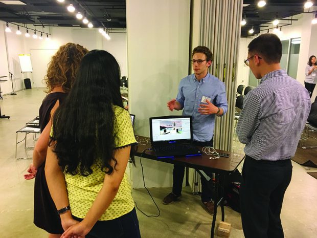 Avery Bedows ’19 demos technology from his virtual reality startup Altar Technologies, Inc. 