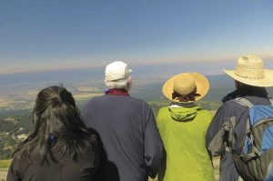 Sagehens watch the moon’s shadow race across the valley floor. Photo by Martha Lussenhop