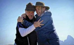 Lew and Chuck Phelps, both ’65, embrace at the end of the event. Photo by Alex Bentley and Hunter Bell.