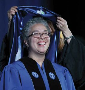 Starr is hooded during the installation ceremony.