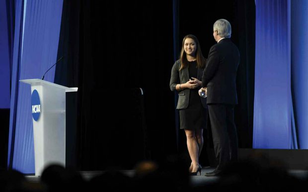 Alaina Woo ’17 onstage with NCAA President Mark Emmert