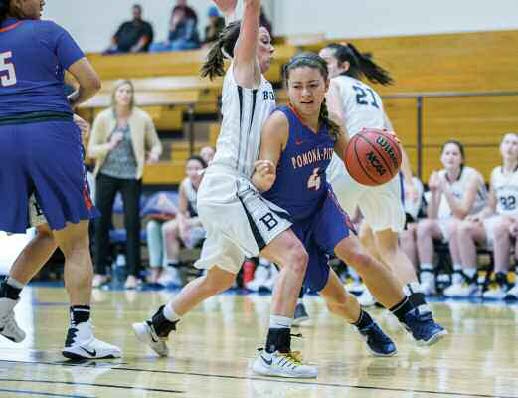 Woo driving the baseline during a game