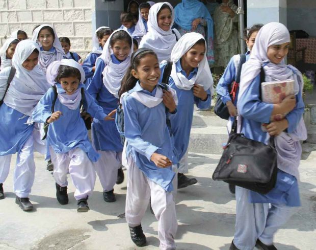 Pakistani children on their way to school.