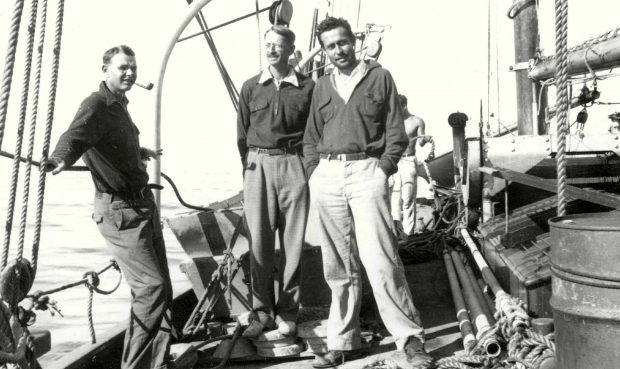 Revelle (right) aboard a research vessel with Harold Sverdrop (center), then director of Scripps Institution of Oceanography.