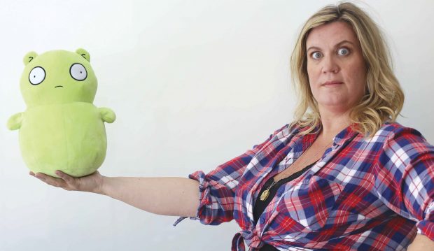 Wendy Molyneux holds a stuffed version of the mysterious Kuchi Kopi character from Bob’s Burgers.