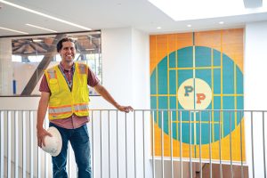 Pomona College Project Manager Brian Faber, overlooking the original PP Logo from the earlier Memorial Gym center court.