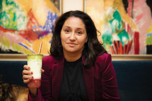 Professor Kyla Wazana Tompkins, a 2023 James Beard Media Award winner, holding a Strawberry Fluffy Matcha at Tea Maru in Arcadia, California.