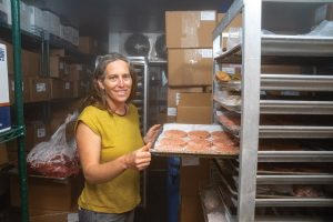 A Farm to School grant will help Selkoe and her team provide salmon patties like these to selected area schools. Photography by Jeff Hing