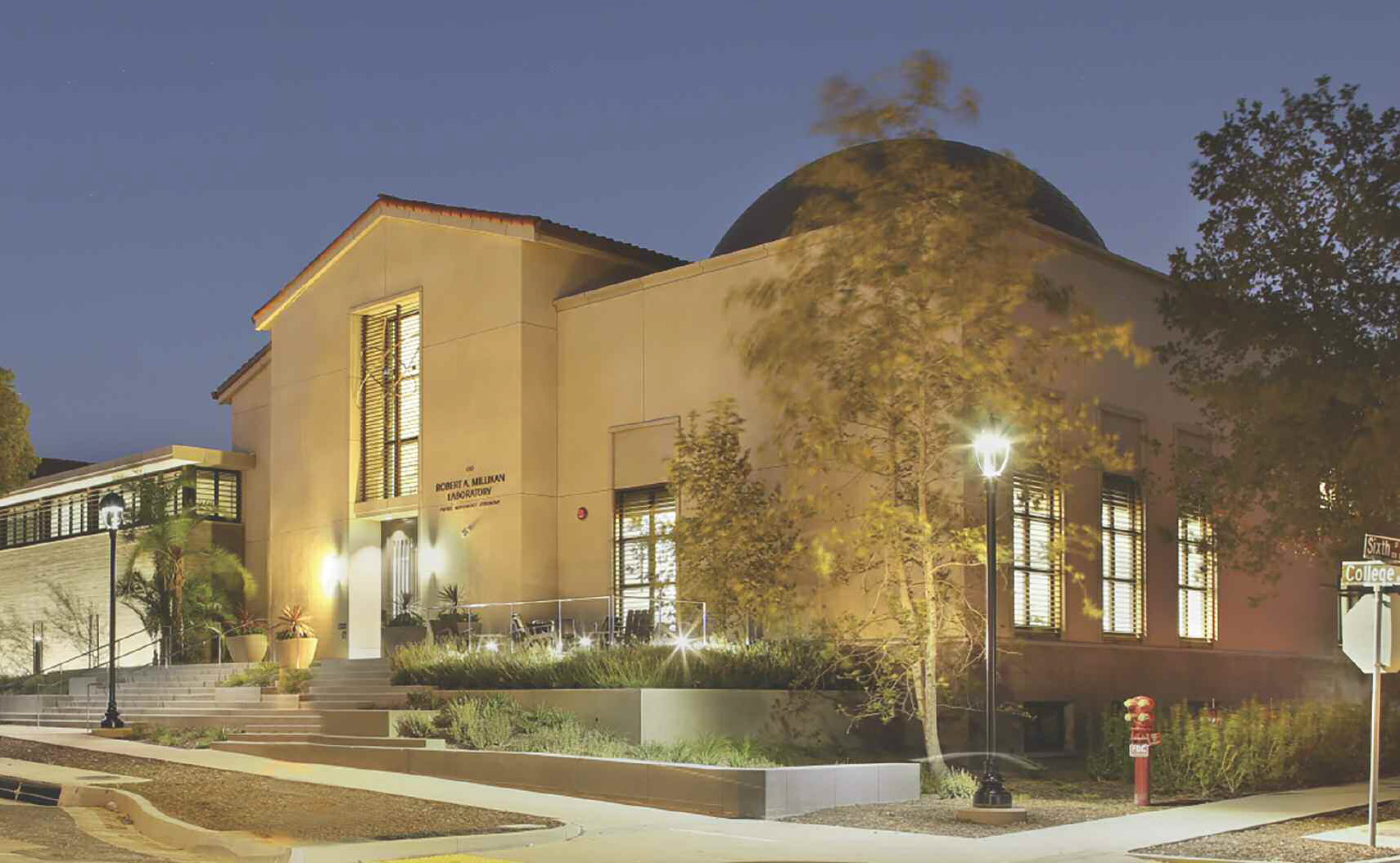 Millikan Laboratory lit up at night