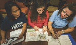 Student Ani Alyce Schug ’17 works with housekeeping staff members Rosario Osorio and Beatriz Tovar on an English lesson