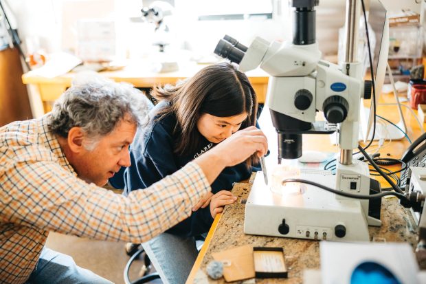 Professor of Geology Jade Star Lackey works with a student in his lab.