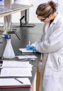 Housen in a chemical engineering/environmental engineering lab at Washington University in St. Louis.