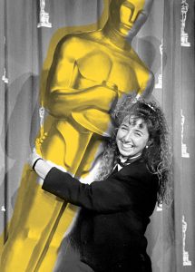 Nancy Newman greets Oscar at the 1991 Academy Awards at the rhe Shrine Auditorium.