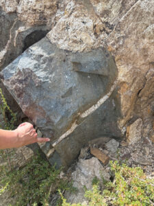 Above, a rock that’s part of the massive Independence Dike Swarm, which extends more than 370 miles across California.