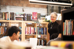 Students in a local library for first-year orientation 2025