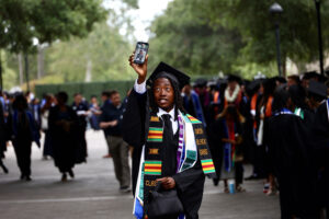 2025 Commencement graduate taking a selfie