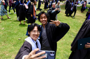 2025 Commencement graduates taking selfies
