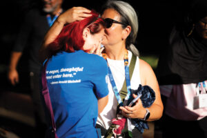 Parent and student saying goodbye during move-in day 2025