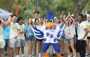 Cecil posing with student leaders during orientation