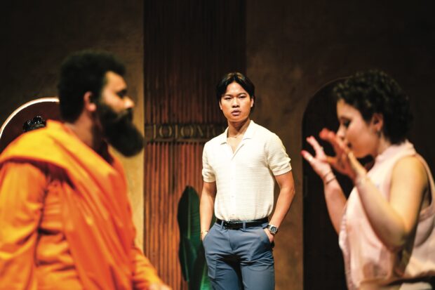 Chris Chow ’26 (center) in the Fall 2026 production of Yoga Play by Dipika Guha.