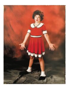 Kaitlyn Casimo as Annie at around 8 years old.