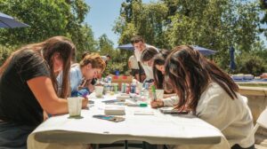 Students, faculty and staff worked on a memory tile project