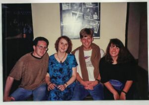 From right, Andrea Venezia ’91, Jeff Rhye ’91, unnamed Prague host, and Venezia’s husband