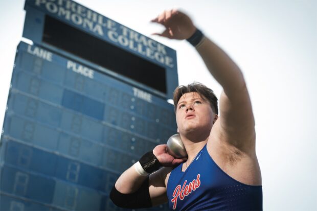 William Marquart ’26 seen throwing a track-and-field shot put