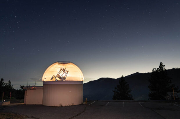 A telescope against the night sky