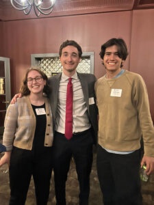 Three Pomona alums at a winter break party